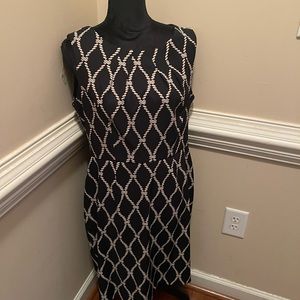 Tan and black sleeveless dress